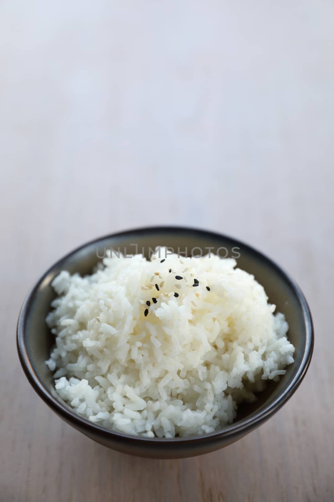 Rice with wood background in close up