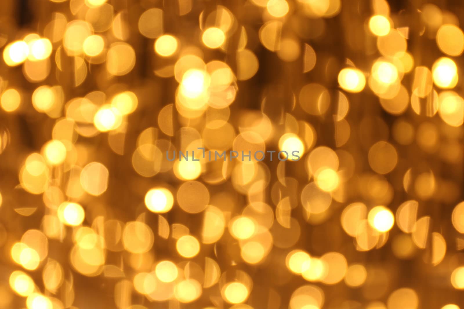 Bokeh background gold yellow colorful of merry christmas, Happy new year bokeh lighting shine on night background, Bokeh glitter light, Gold Luxury backdrop texture, Glittering wallpaper