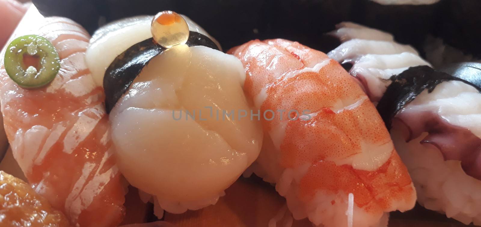 Sashimi and sushi close up. rice and fish japanese food by AndrewUK