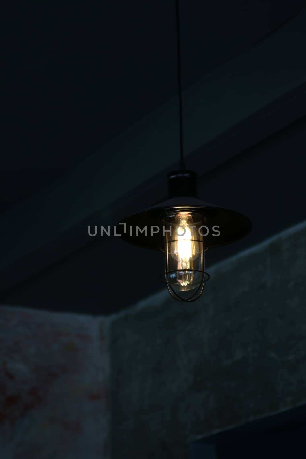 Old Modern Lamps hanging on the wall in the dark, Artificial lamp Decorate in the dark by cgdeaw