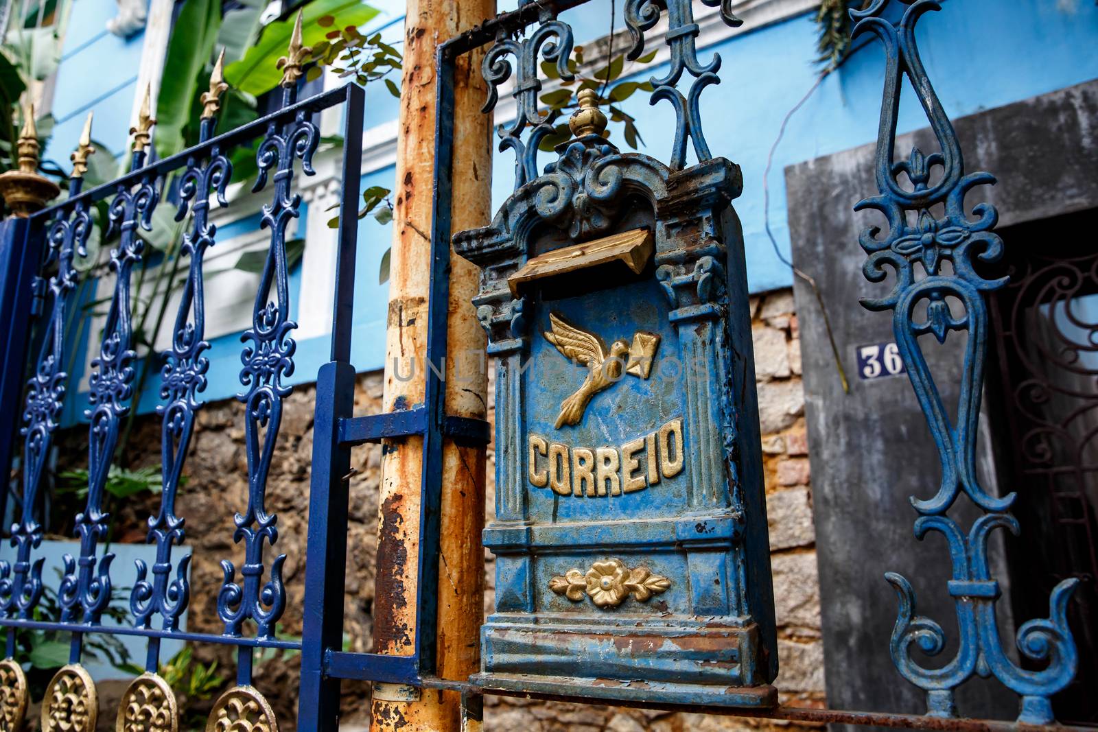 Mailbox on a house in Portugal. The word "Correo" translates as "Mail"