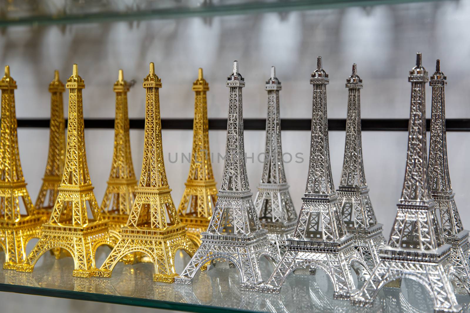 Gift shop in Paris. Small copies of the Eiffel tower. by 9parusnikov