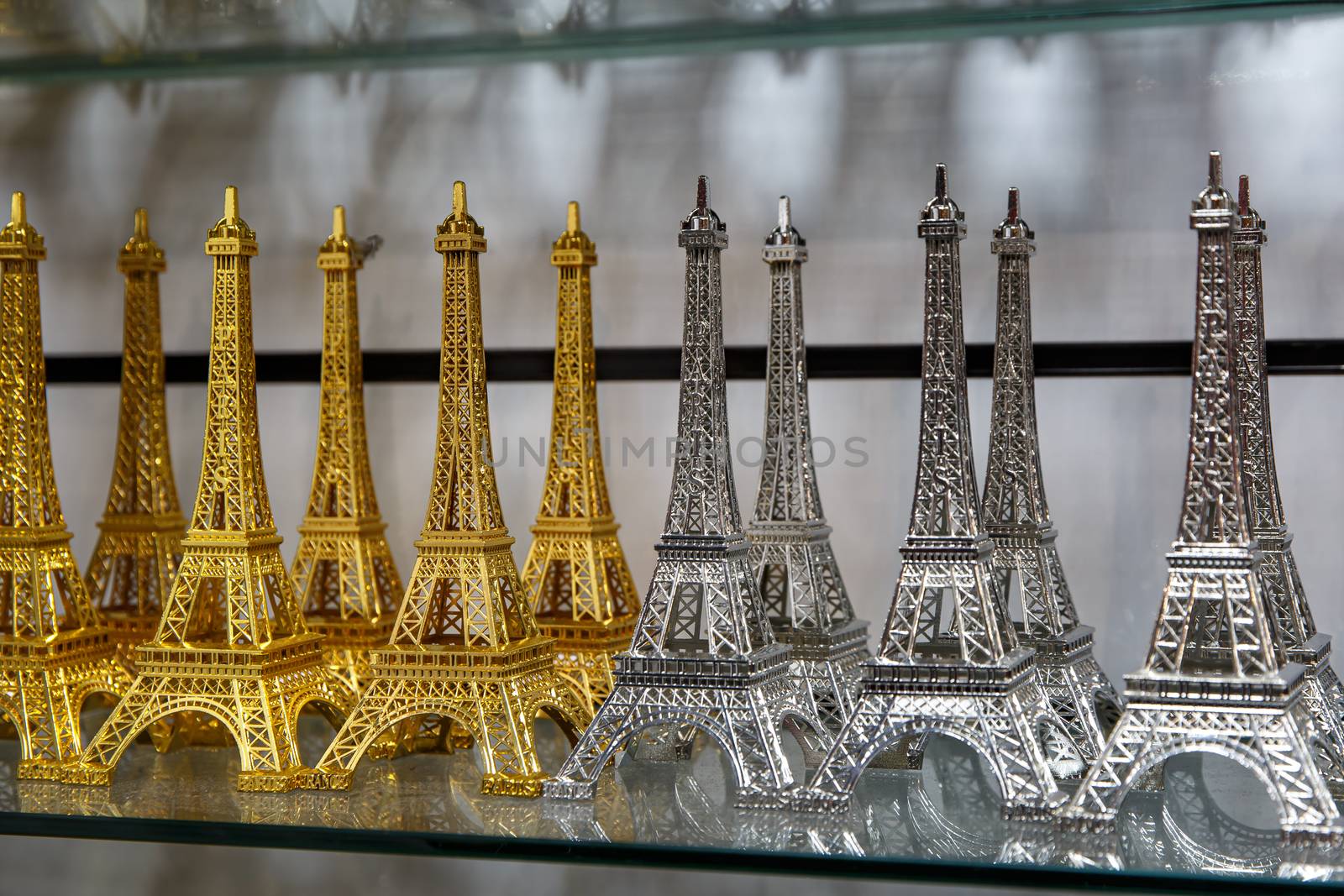Gift shop in Paris. Small copies of the Eiffel tower. by 9parusnikov