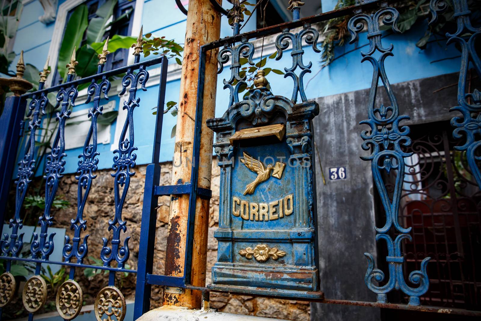 Mailbox on a house in Portugal. The word "Correo" translates as "Mail"