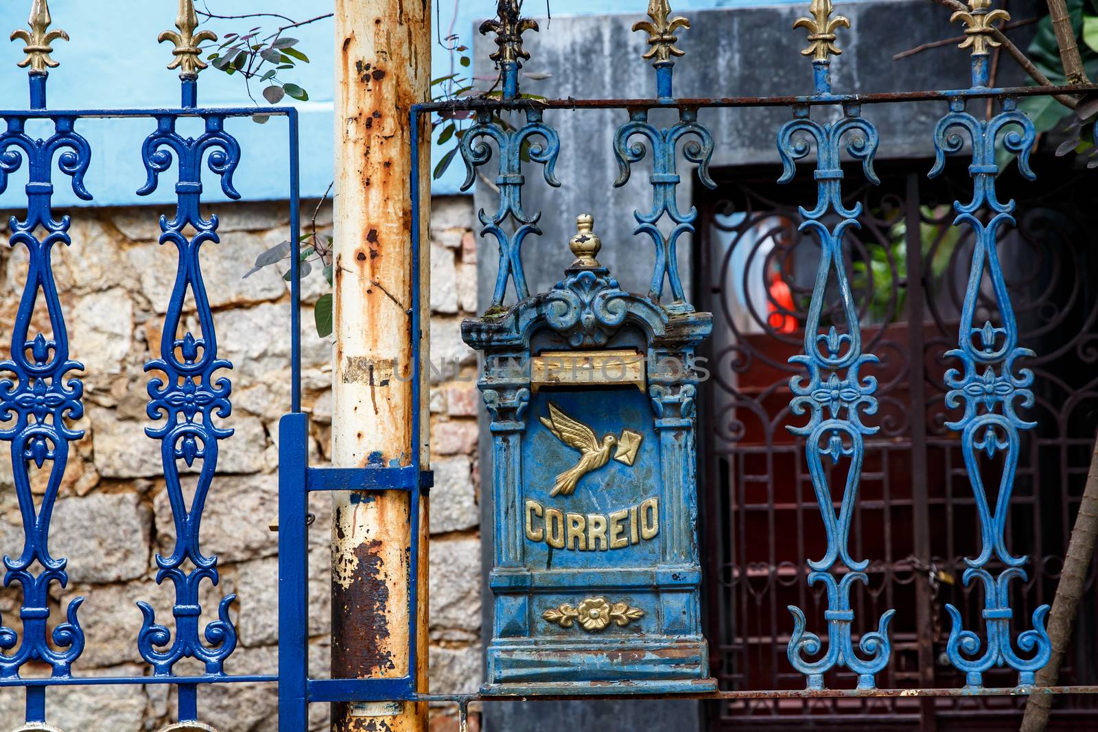 Mailbox on a house in Portugal. The word "Correio" translates as "Mail"