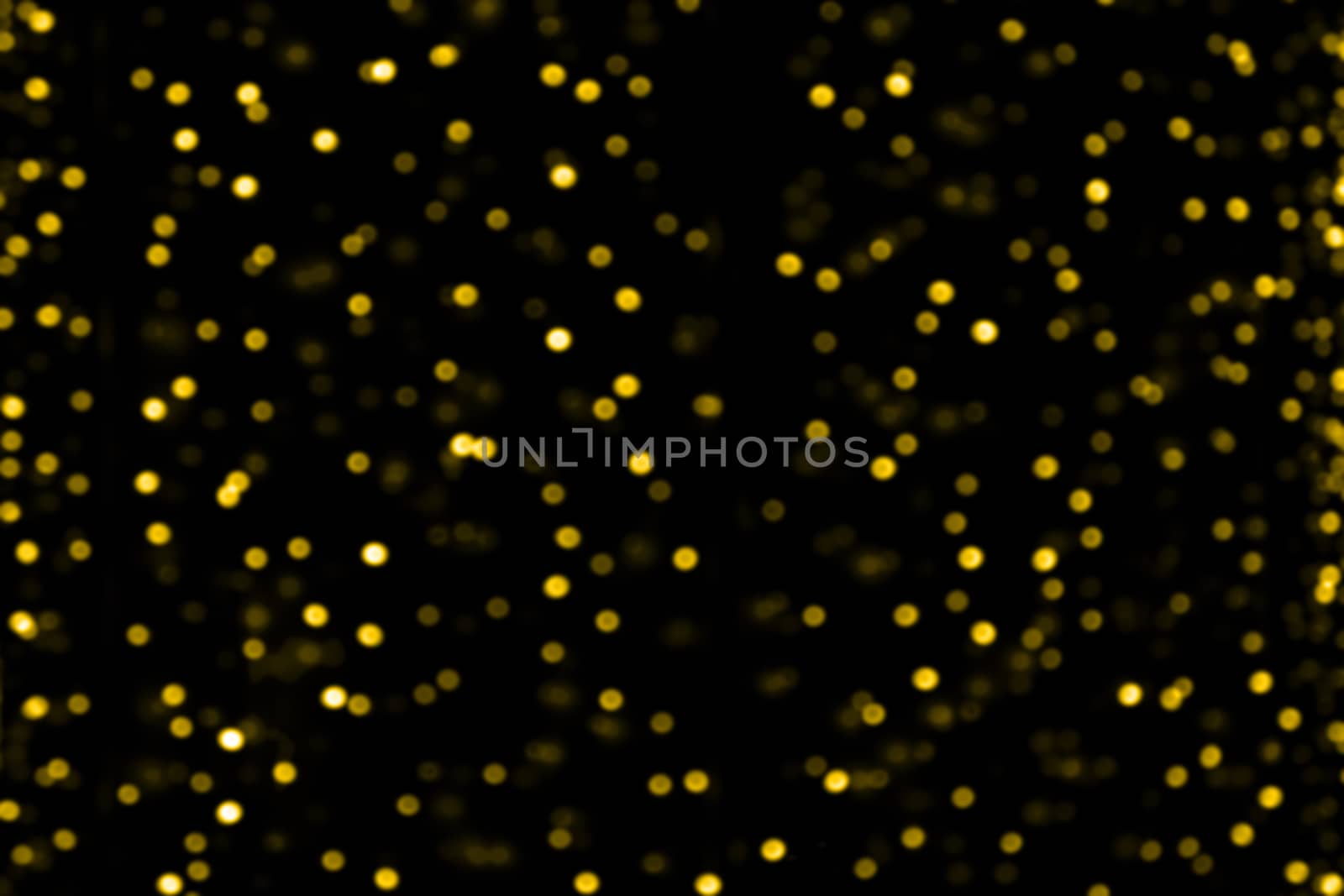 blurred bokeh yellow gold light luxury background, gradient yellow golden bokeh light glitter and shine background