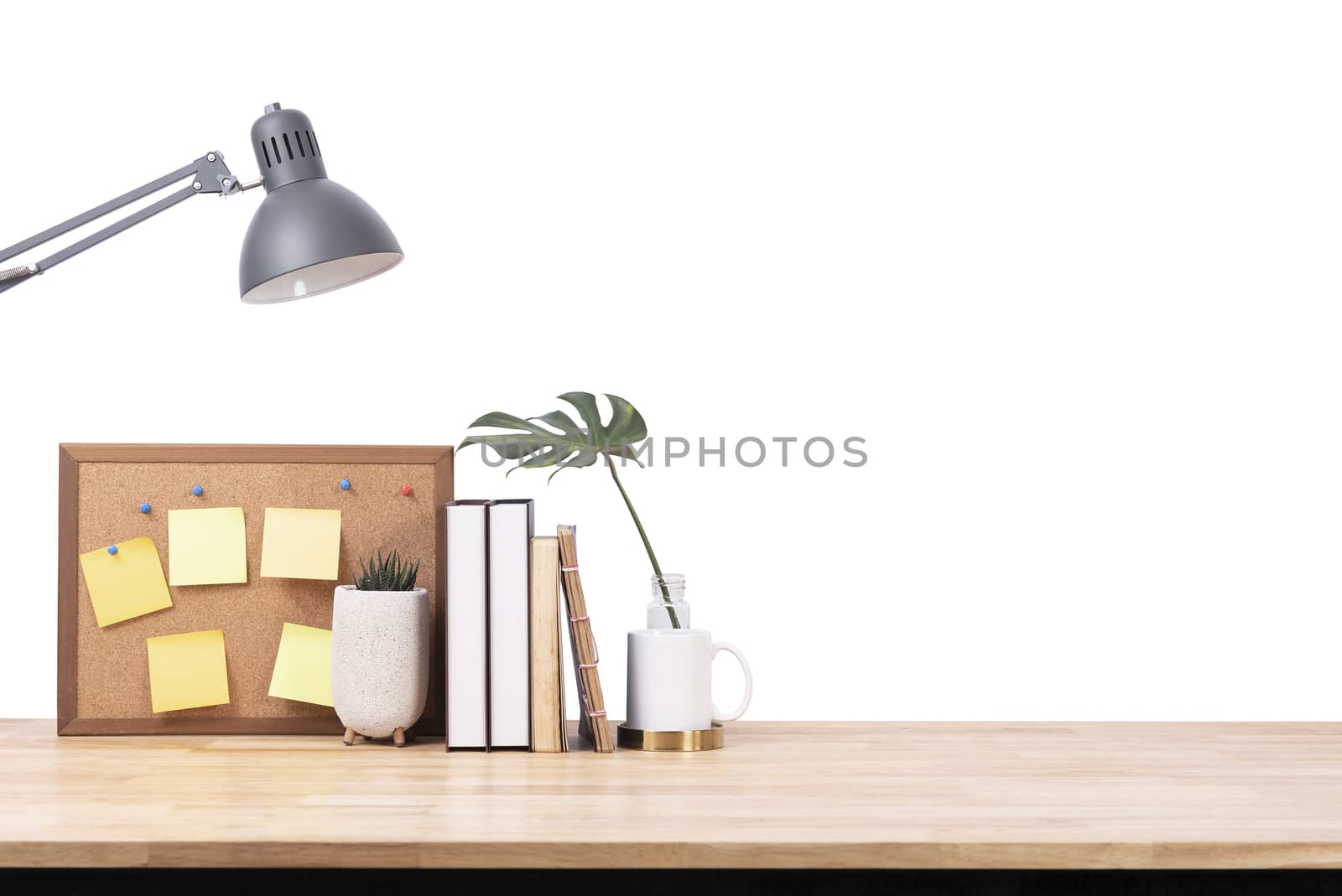 Empty wooden desk space over white background. Product display
