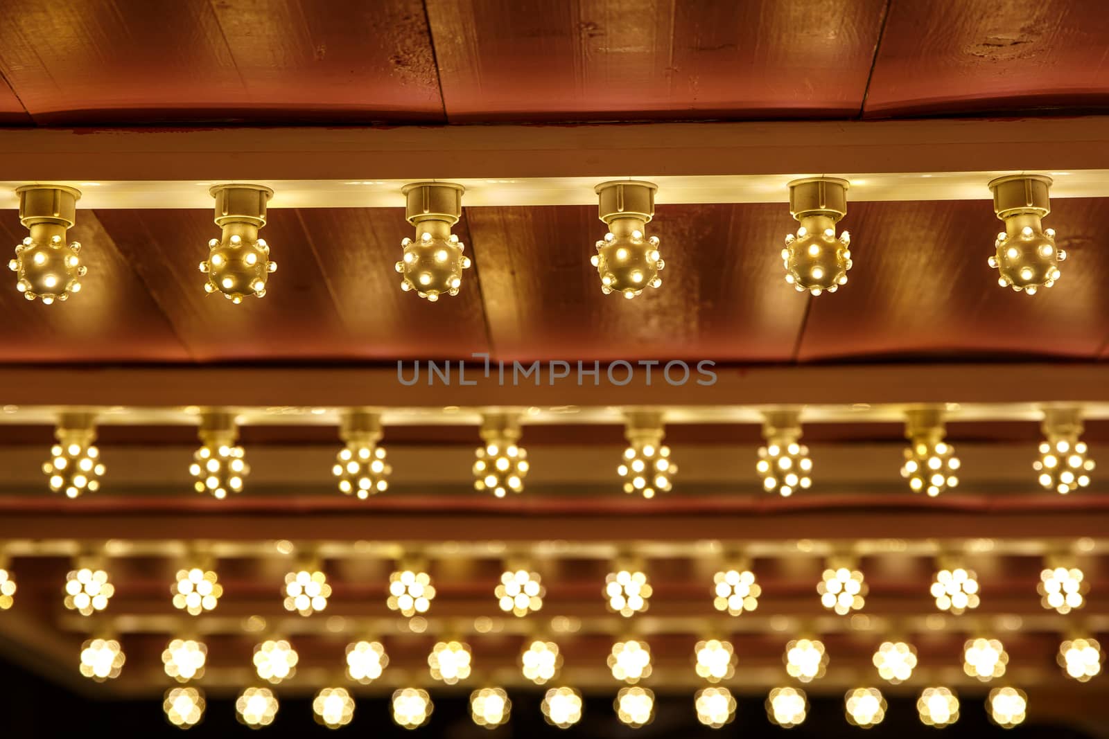 The row of incandescent bulbs. Lights background