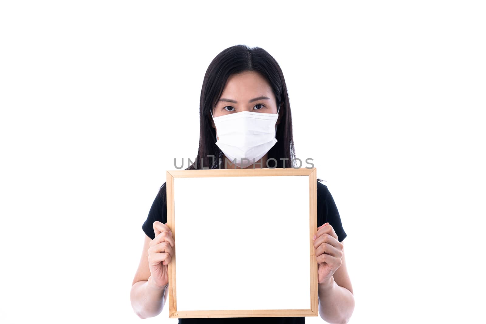 An Asian woman wearing a white mask and holding an empty board f by animagesdesign