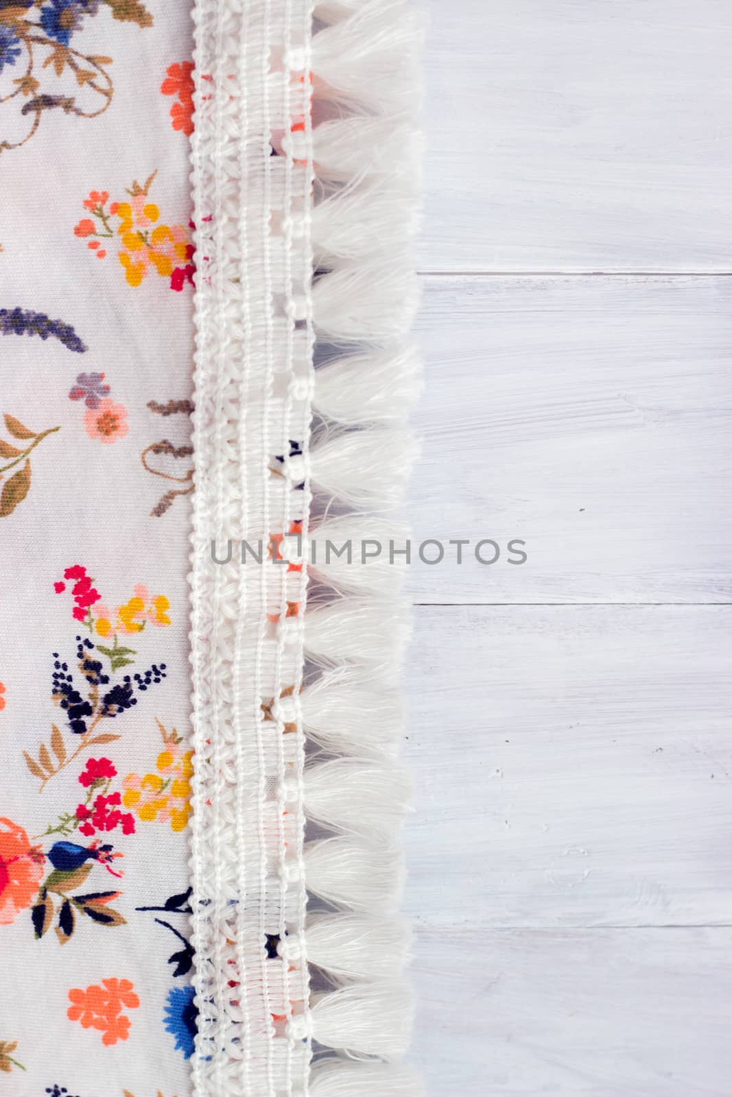 Shabby chick, floral fabric on white wooden background by Mima_Key