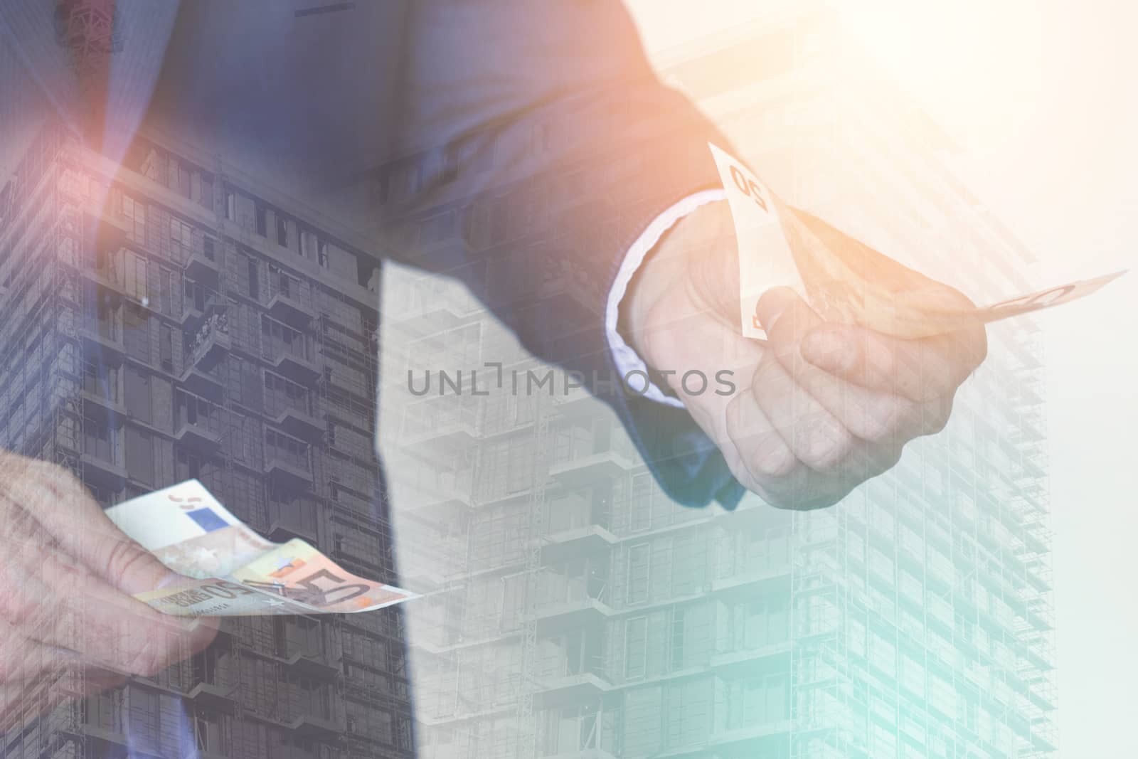Double exposure of businessman with money in his hands and construction sight behind him; corruption concept 