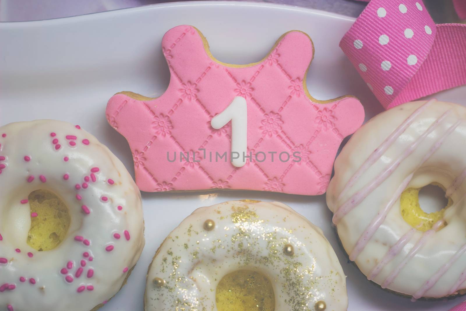 First birthday cookies - royal icing crown shape cookie and decorated donuts