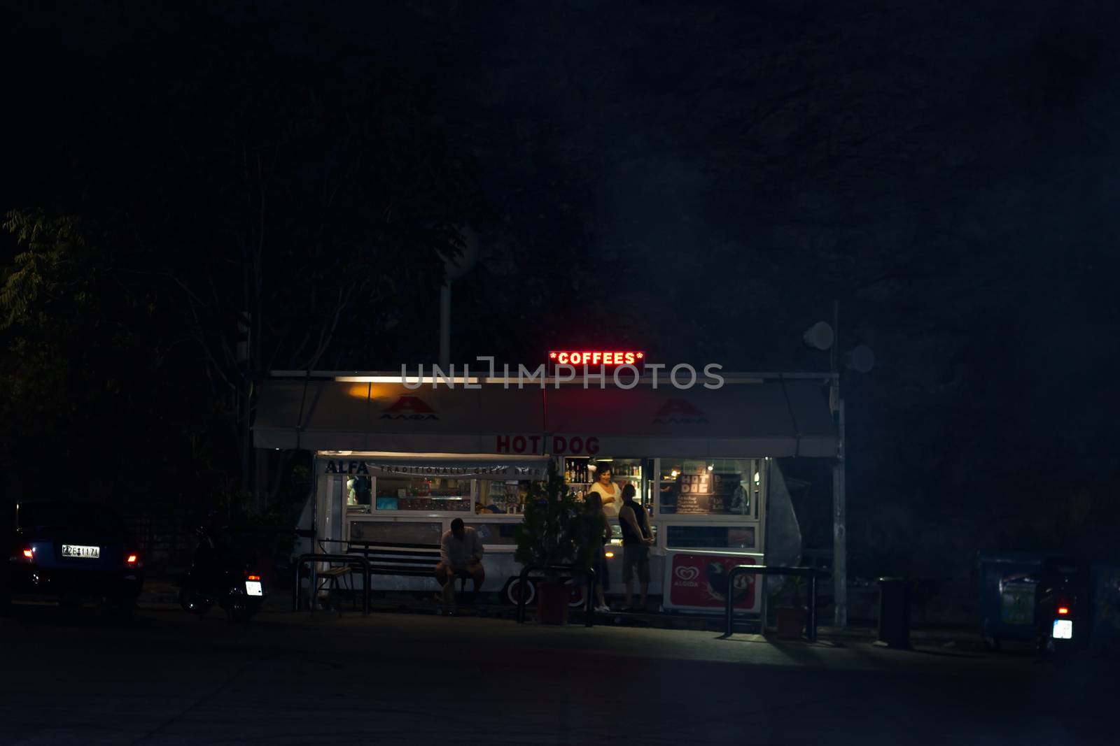 ATHENS, GREECE - JULY 07, 2017: View at small kiosk at parking of Likavitos open theater at Likavitos hill, Athens, Greece, at night