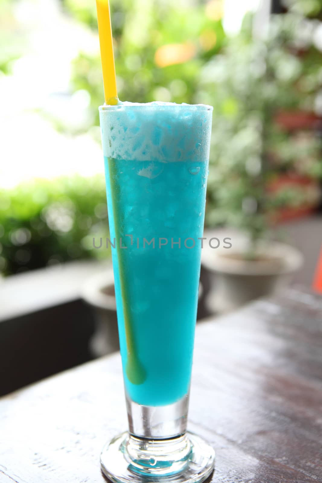 cocktail with blue curacao  by piyato