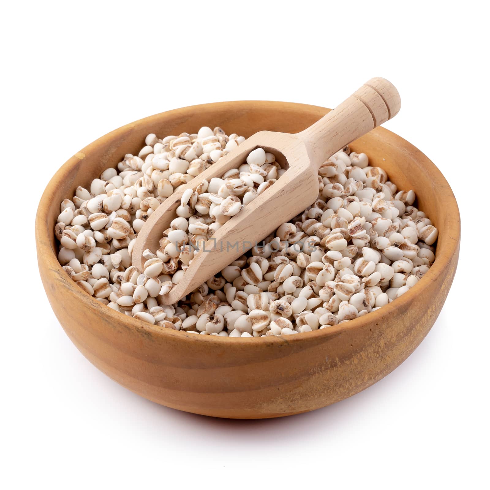 Millet rice in a wooden bowl isolated on white background.