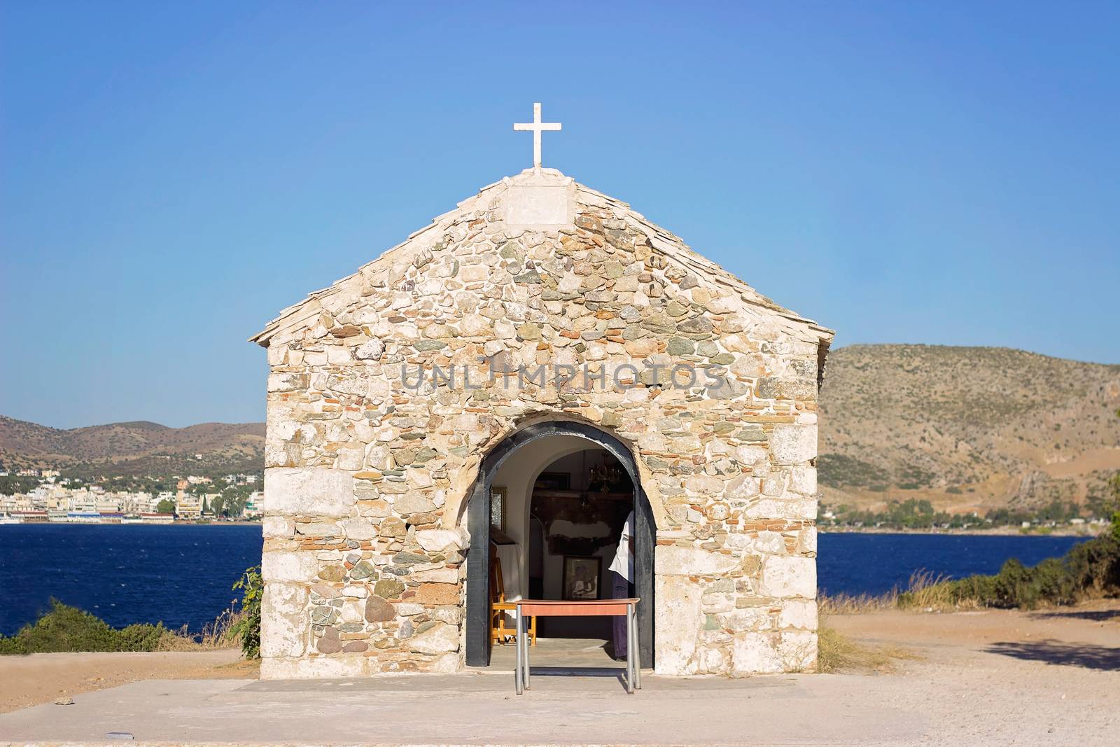 Small chapel on the hill, above the sea
