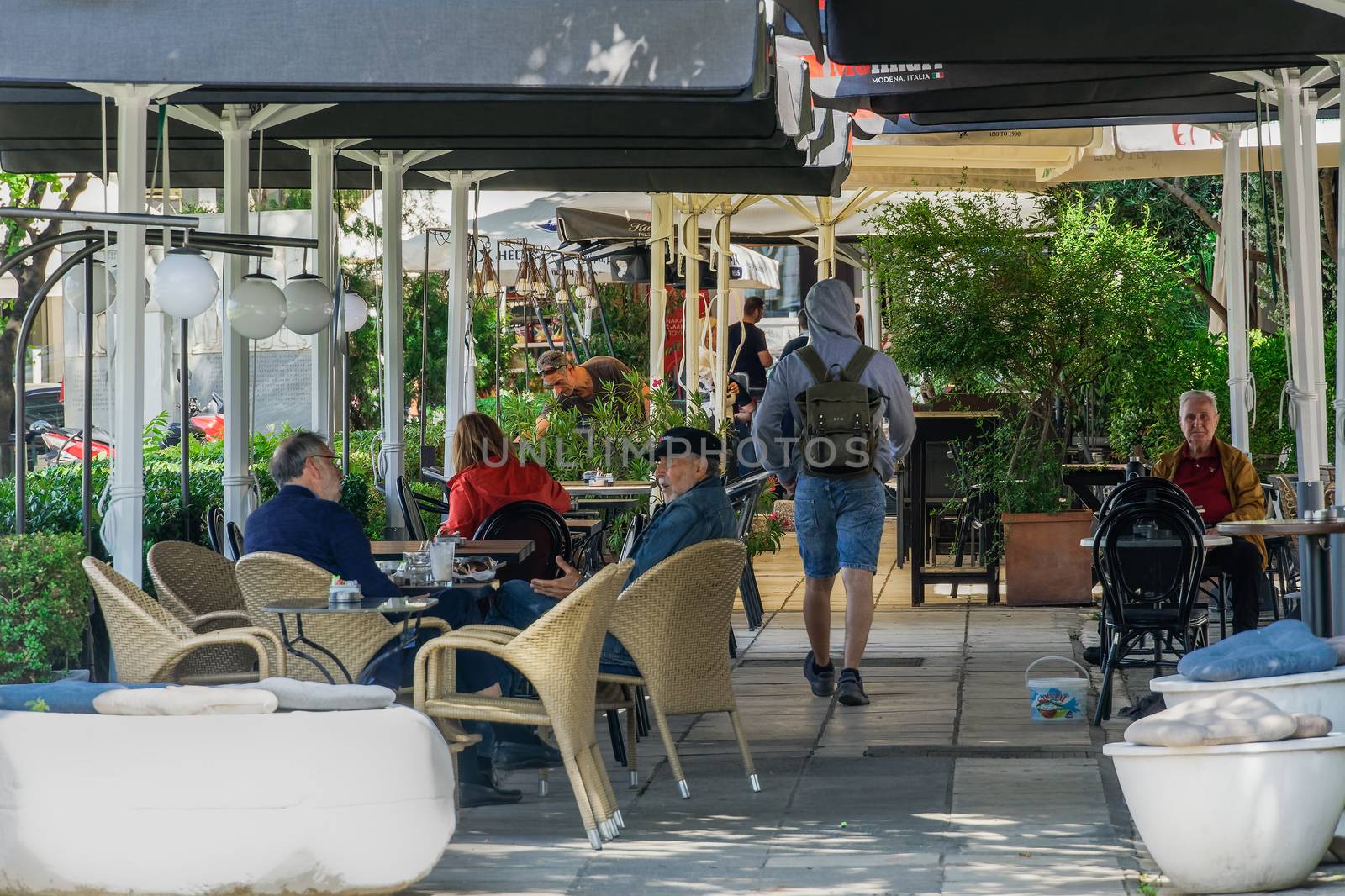 Crowd sitting on bar restaurants at the city center, after Hellenic government loosens COVID-19 coronavirus measures.