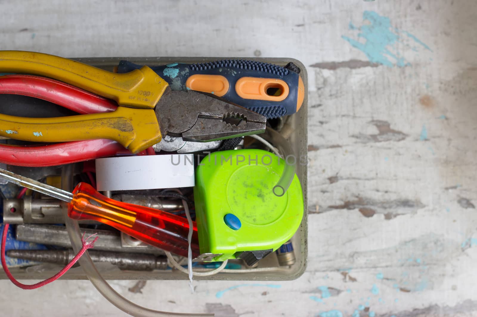 Various tools in the box, on white background