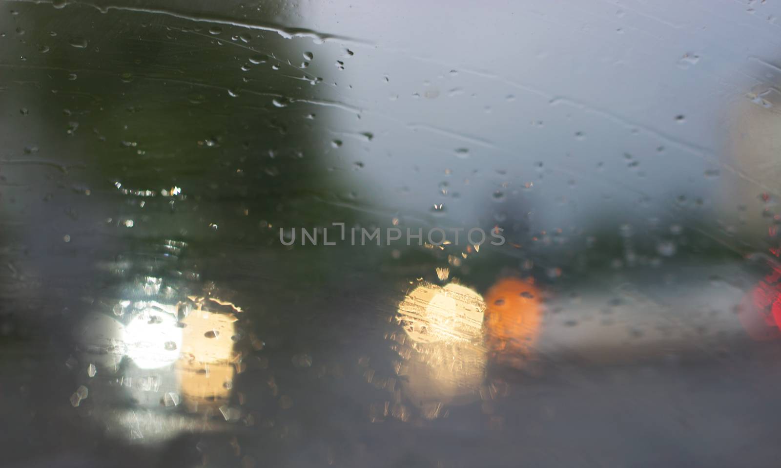 Rain - blurred view from the car interior, behind the windshield by Mima_Key