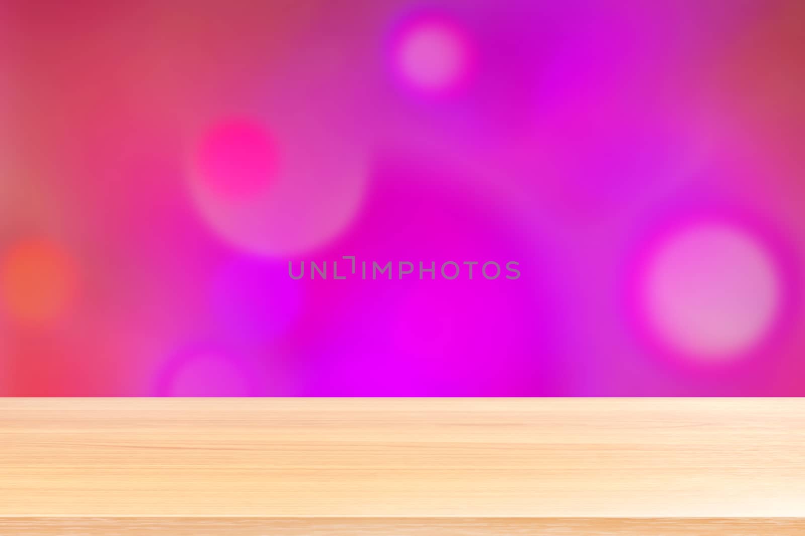 wood table board empty in front, wooden plank blank on bokeh pink purple luxurious background, perspective brown wood table front for mock up display products