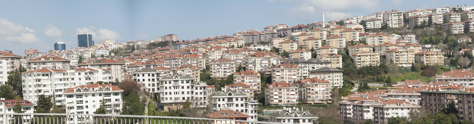 Panoramic view over a residential housing district on hillside in city