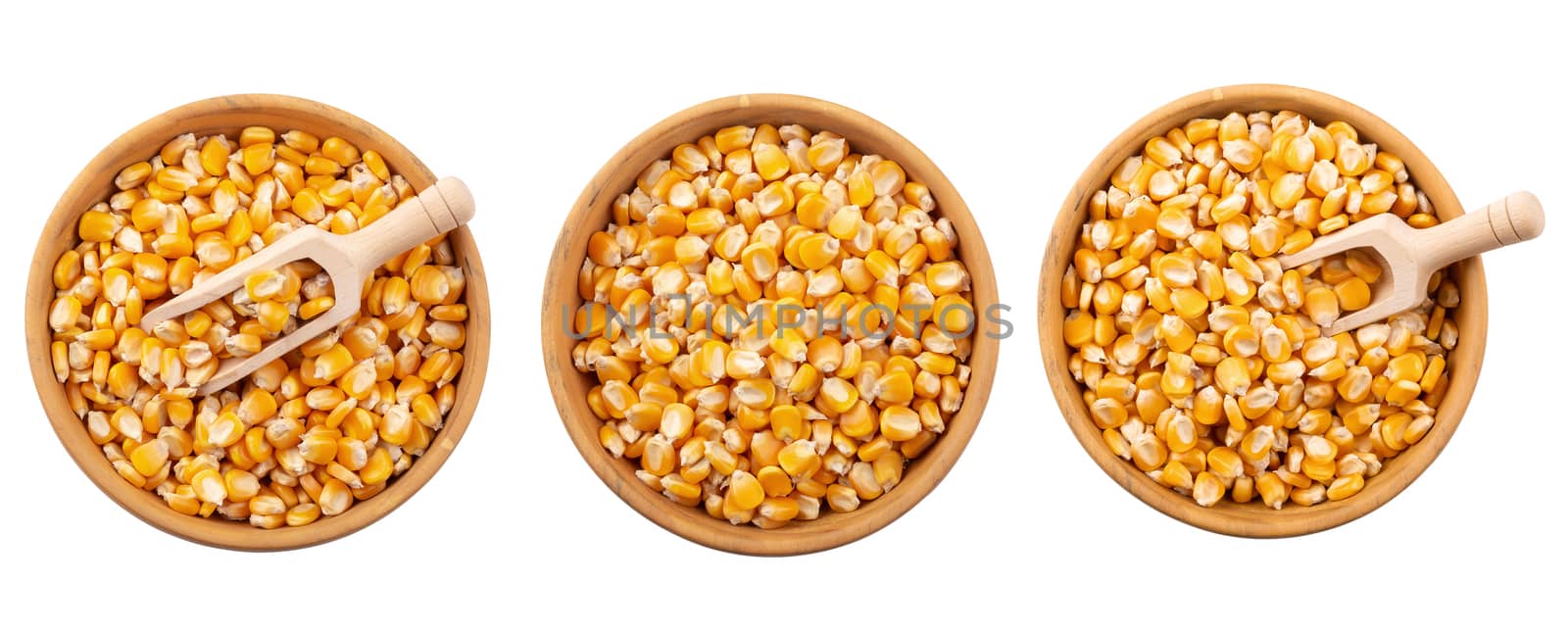 Corn seeds in a wooden bowl isolated on white background by kaiskynet