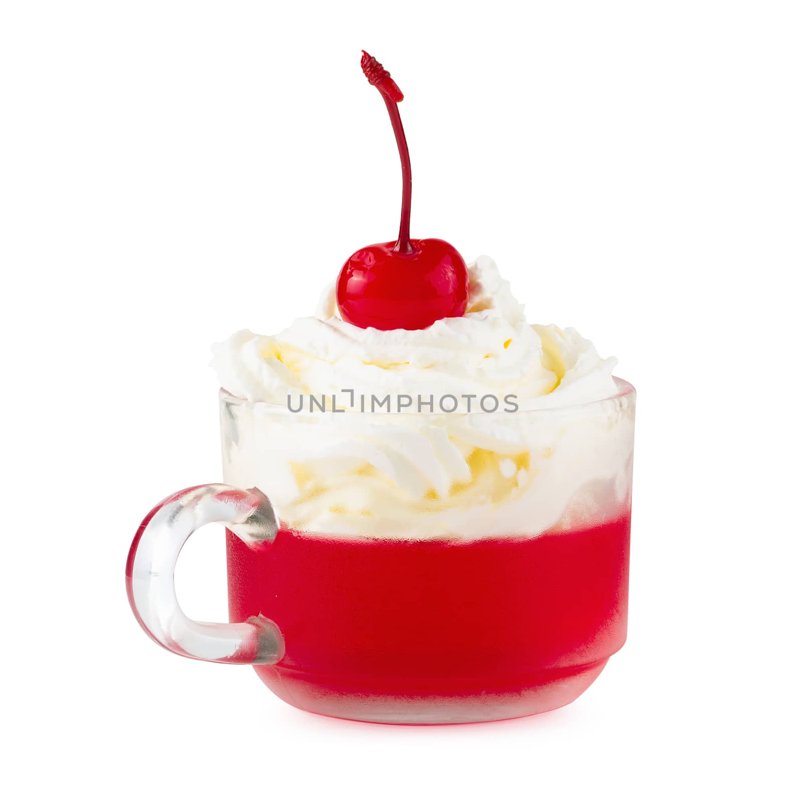 Strawberry jelly in a glass topping with cherries and whipped cream isolated on white background.
