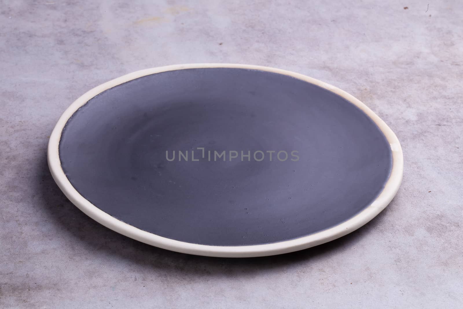 Empty blank ceramic dish isolated on white background