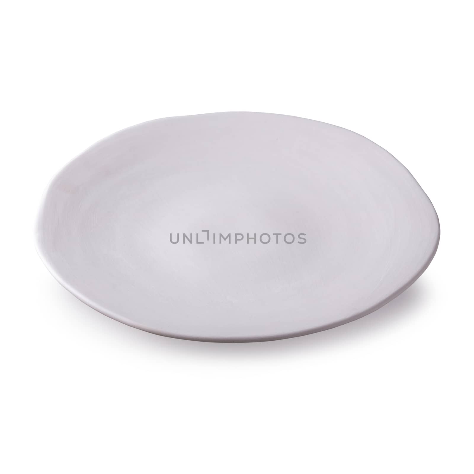 Empty blank white ceramic dish isolated on a white background.