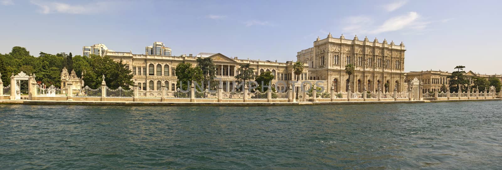 Large palace in Istanbul, Turkey on the edge of the Bosphorus river