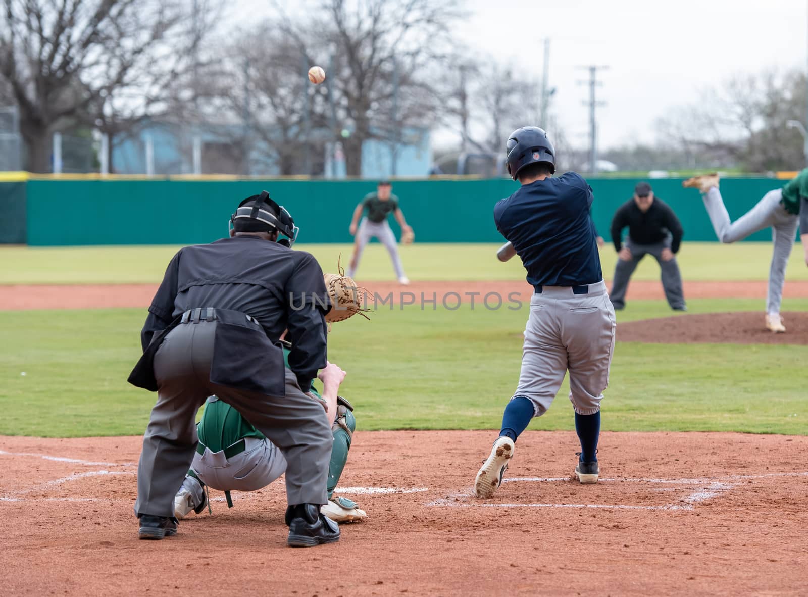 Baseball Player Making Exciting Play During a Baseball Game by Calomeni