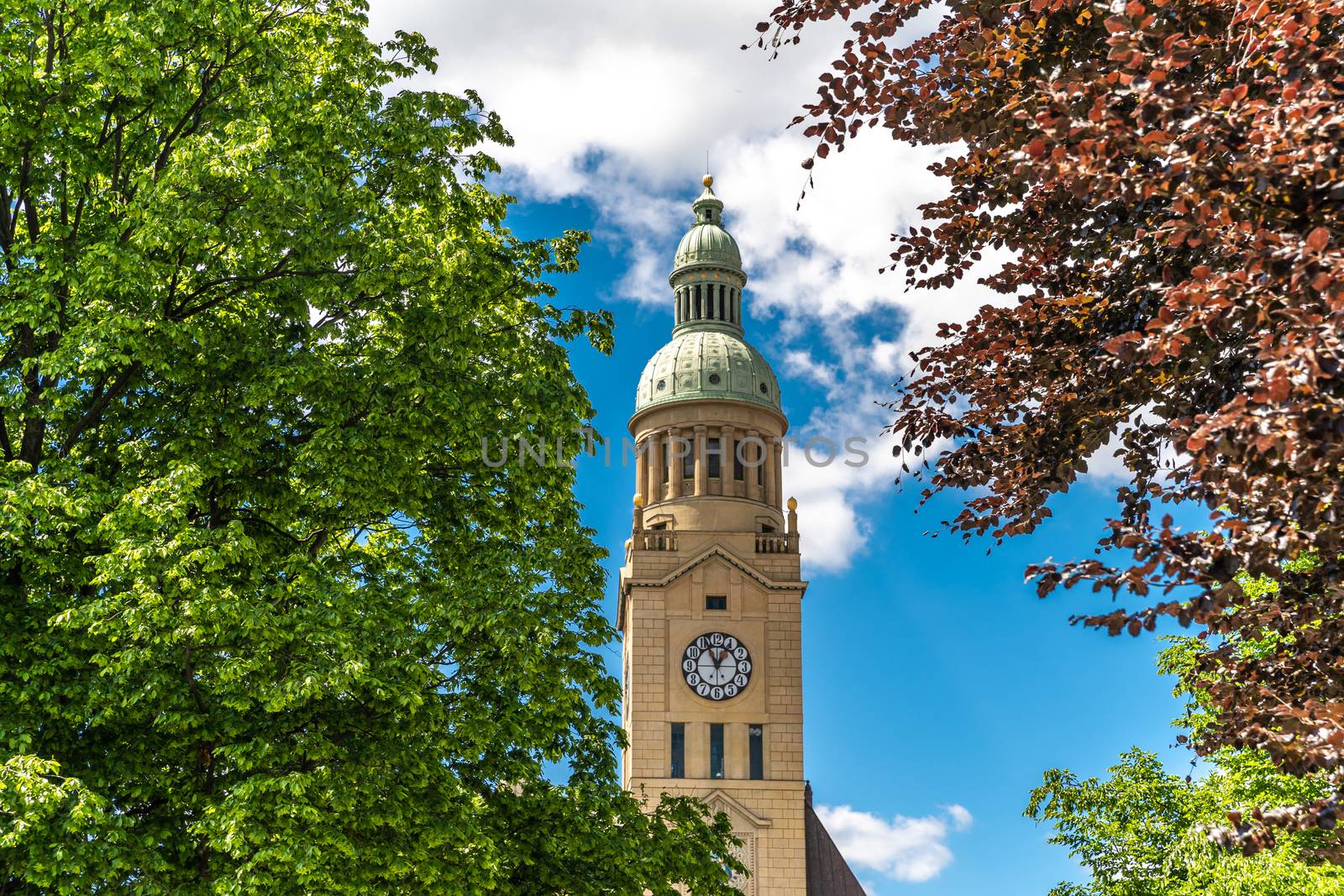 clock tower on the square of european city.