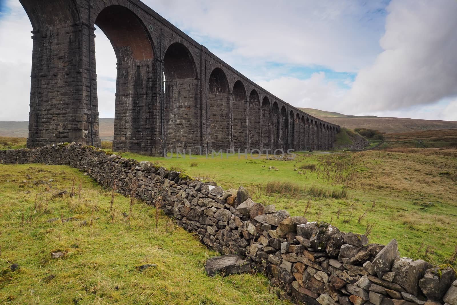 The iconic Ribblehead Viaduct or Batty Moss Viaduct which carries the Settle to Carlisle railway across Batty Moss in the Ribble Valley, Yorkshire Dales, UK