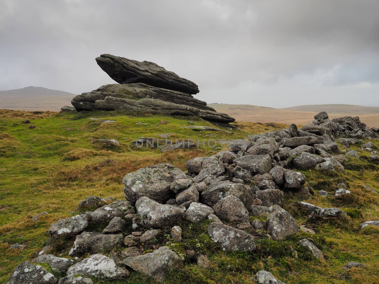Rabbit Rock and Irishman's Wall next to Belstone Tor set under a grey sky, Dartmoor National Park, Devon, UK