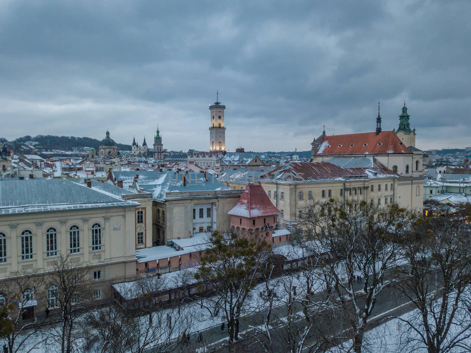 LVOV, UKRAINE, December. Panorama of the ancient city. Ukraine Lviv City Council, Town Hall. The roofs of old buildings. Aerial view. Winter