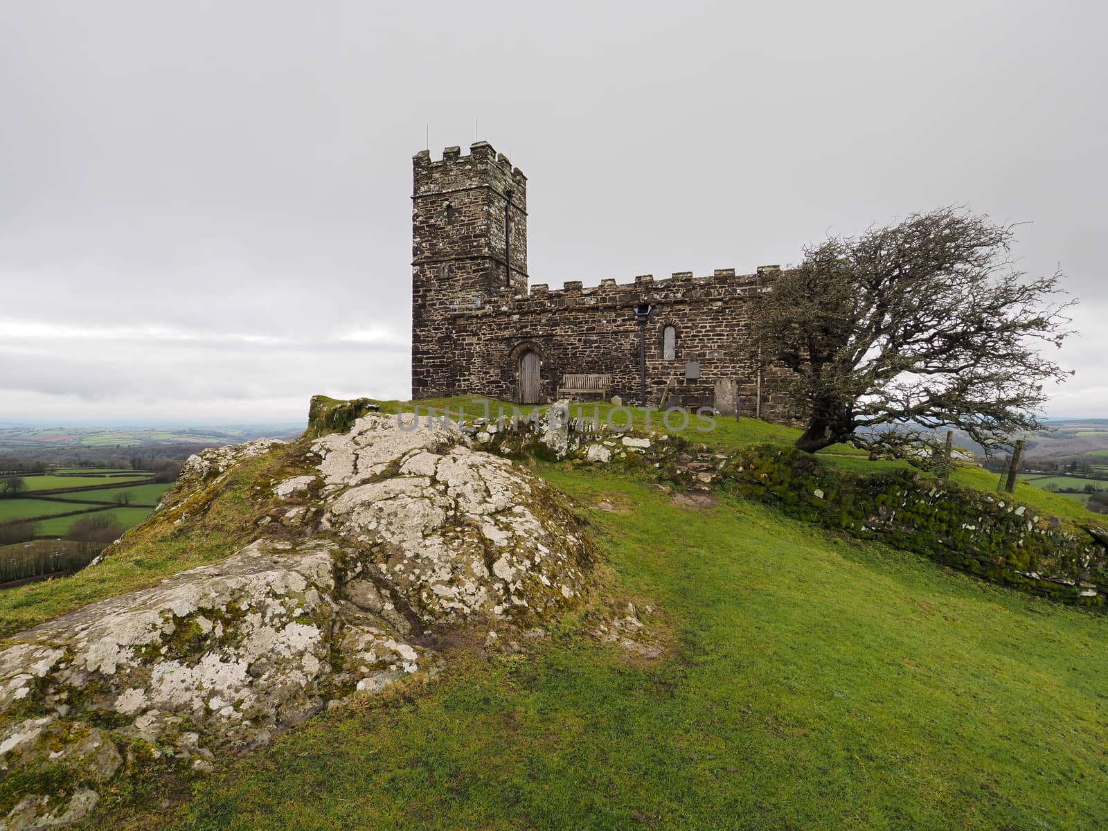 The isolated 13th century church of St Michael de Rupe which sits on top of Brent Tor, an old weathered volcano, Dartmoor National Park, Devon, UK