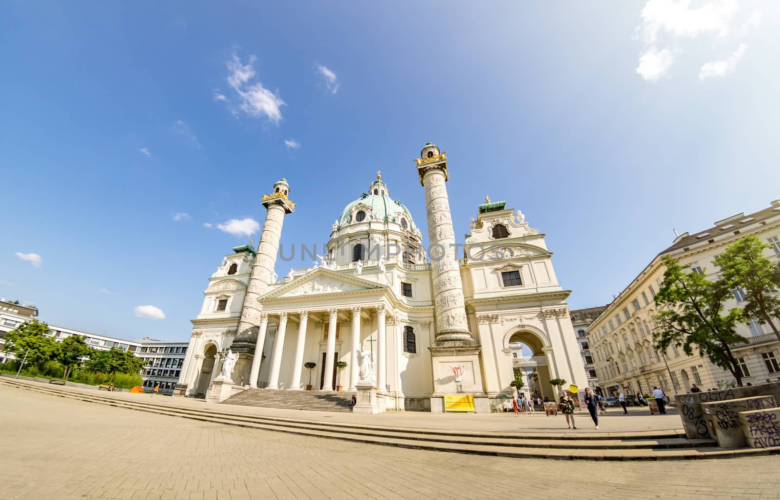 Vienna, Austria - June 7 2019: Wide Angle St. Charles Church (Karlskirche), is a baroque church located on the south side of Karlsplatz in Vienna, Austria. Widely considered the most outstanding baroque church.