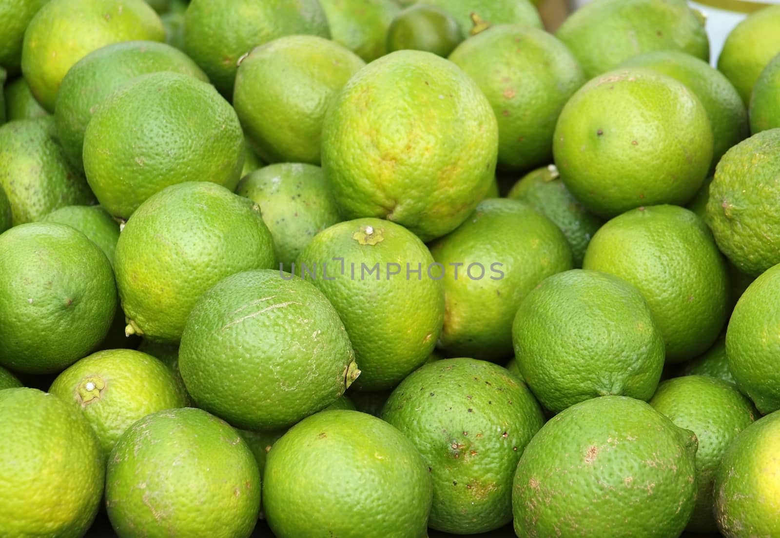 Fresh Green Lemons by shiyali