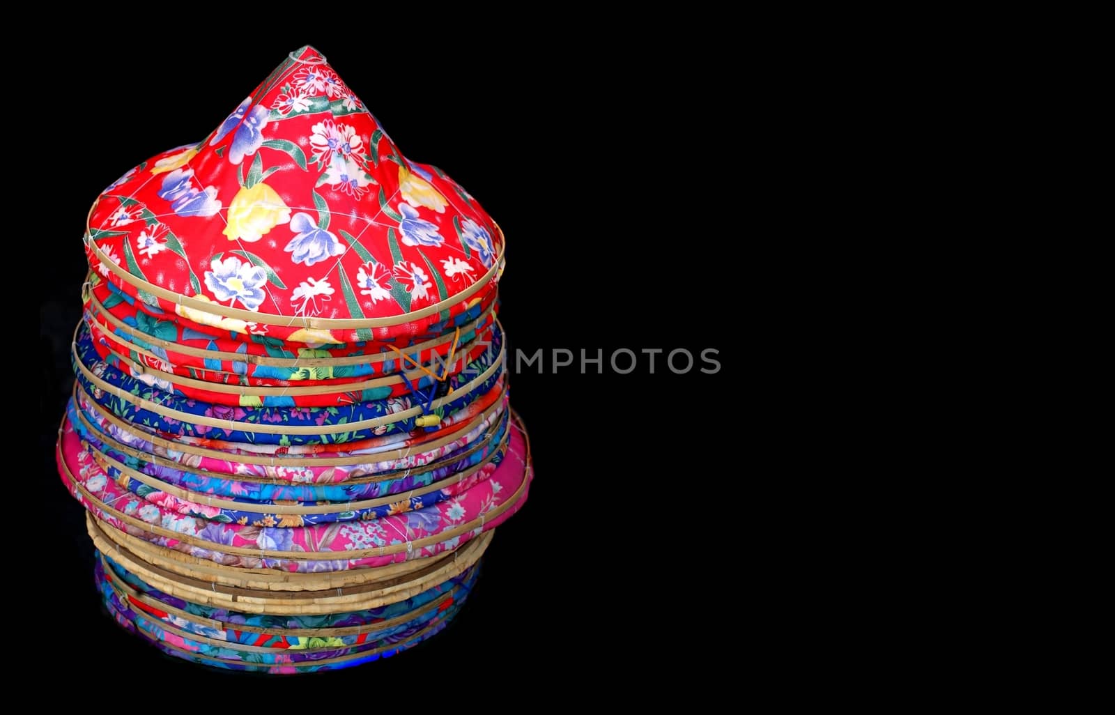 Traditional Chinese straw hats covered with colorful cloth