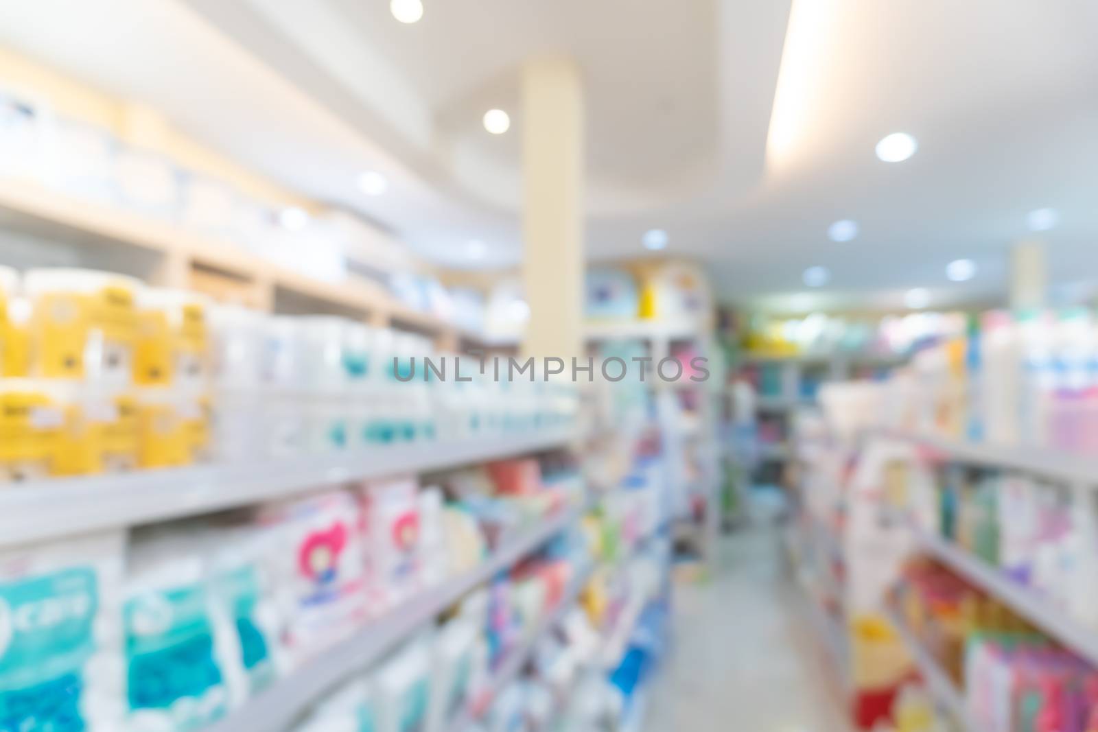 Blur modern baby and kid deparment  store shop bright tone abstract blurry background.