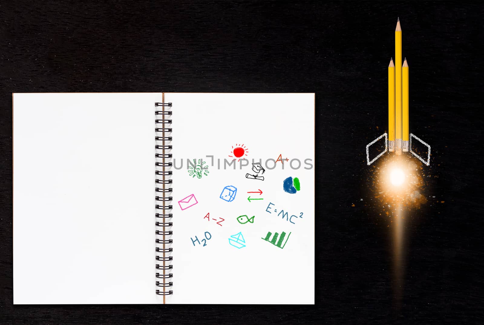 Education concept, knowledge management, yellow pencil rocket on chalkboard background