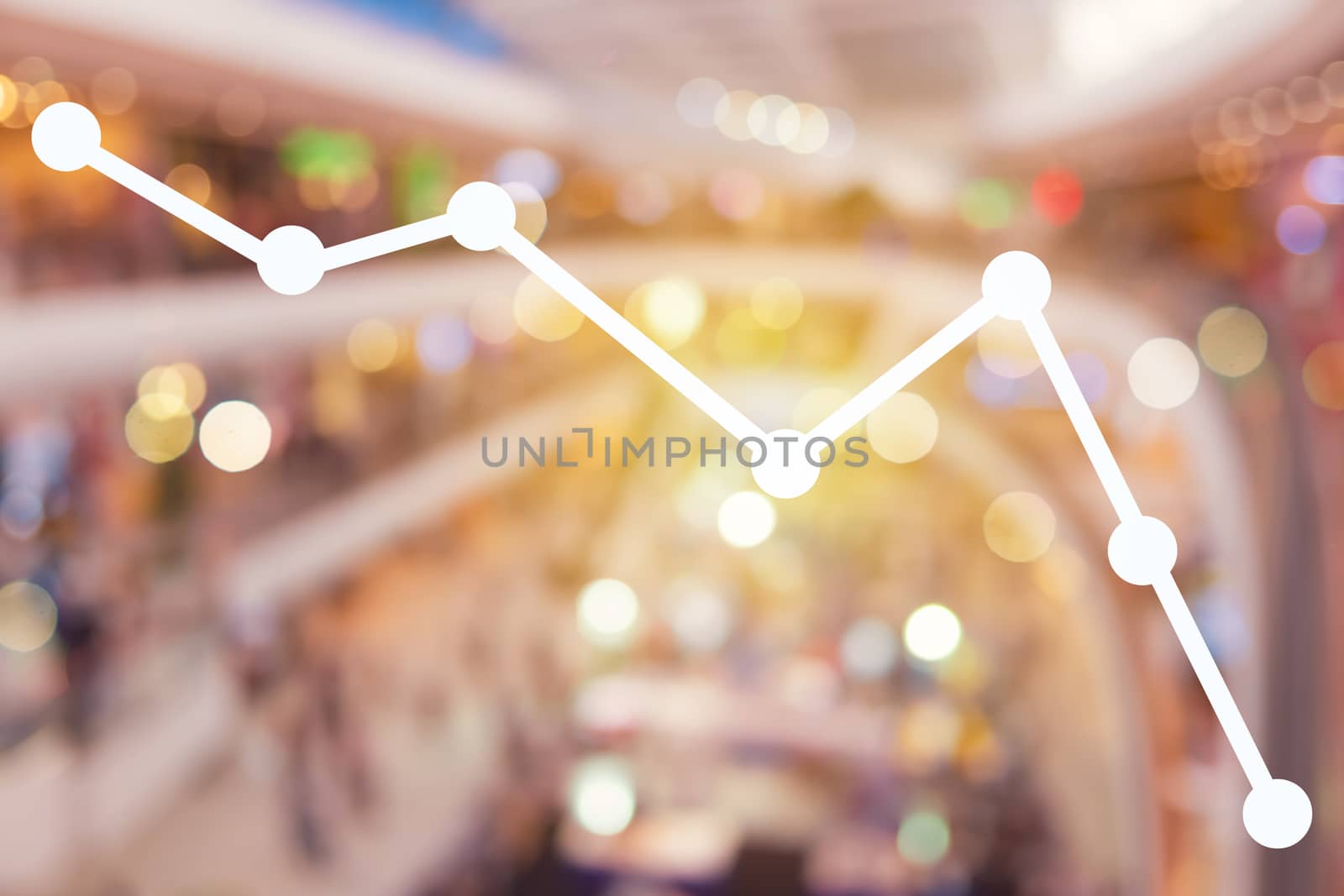 Down trend graph on blur mall department store background. by Suwant