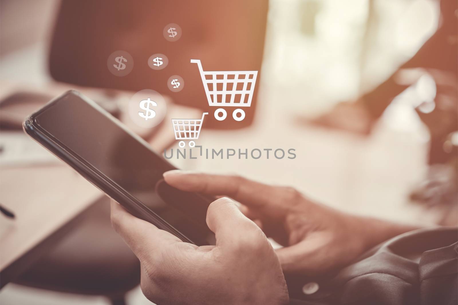 Women hand using smartphone do online business or shopping online in black friday with cart, dollar icons pop up in public area background. Social media maketing concept.