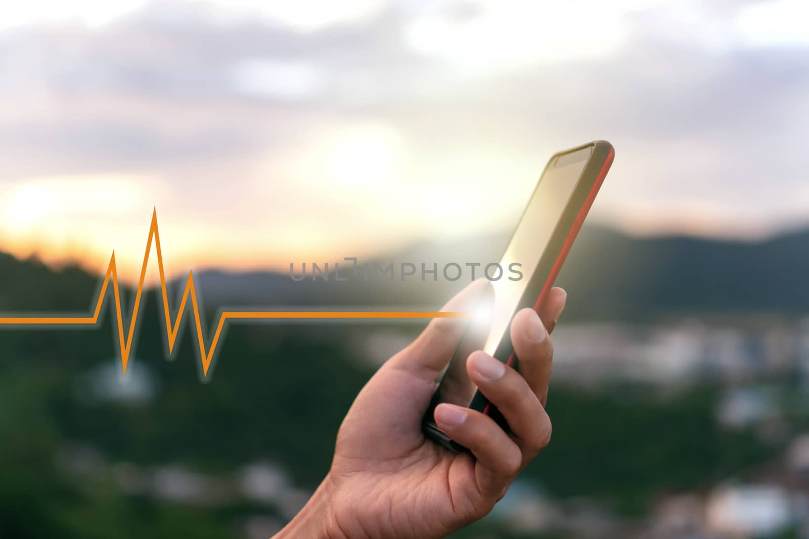 Woman hand holding smartphone with vital sign of heart beat background. Business technology health connection. by Suwant