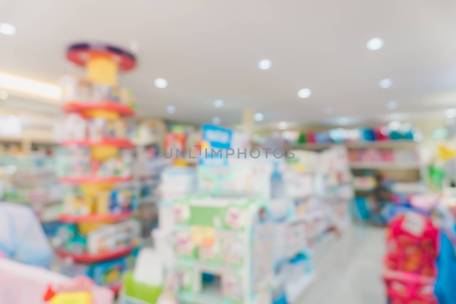 Blur modern baby and kid deparment  store shop bright tone abstract background. by Suwant