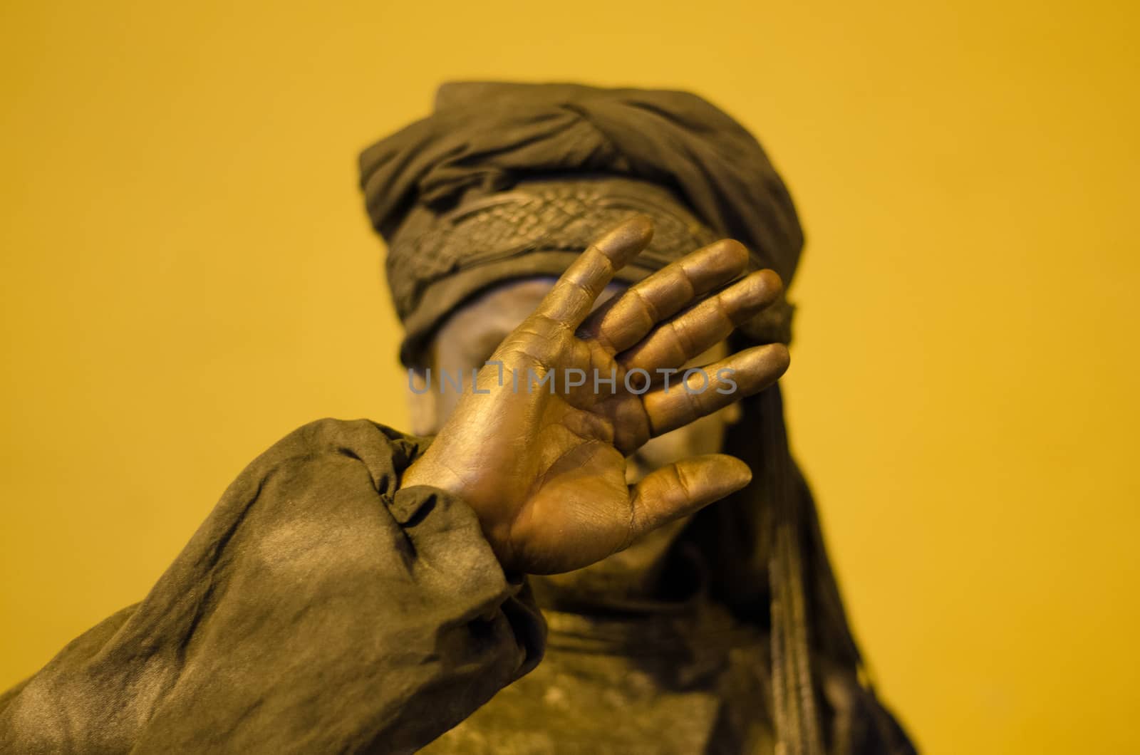 Man covering his face by Peruphotoart
