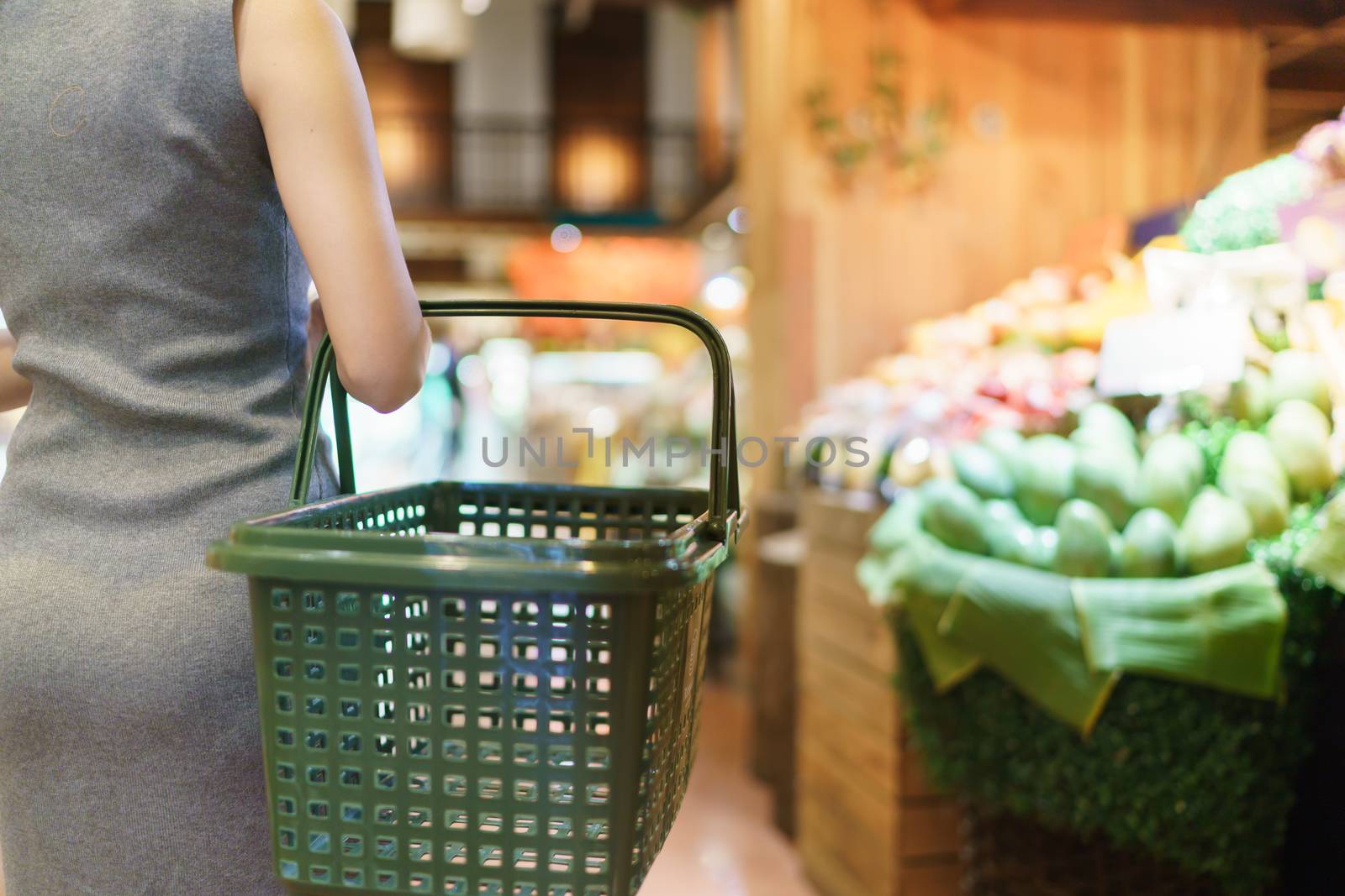 shopping in supermarket with shopping basket