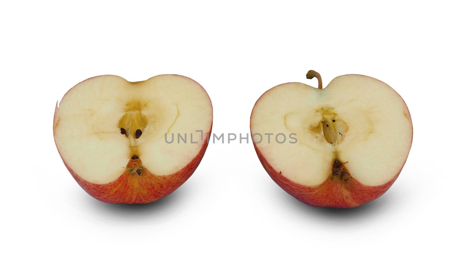 2 halved apples isolated on a white background with clipping pat by Unimages2527