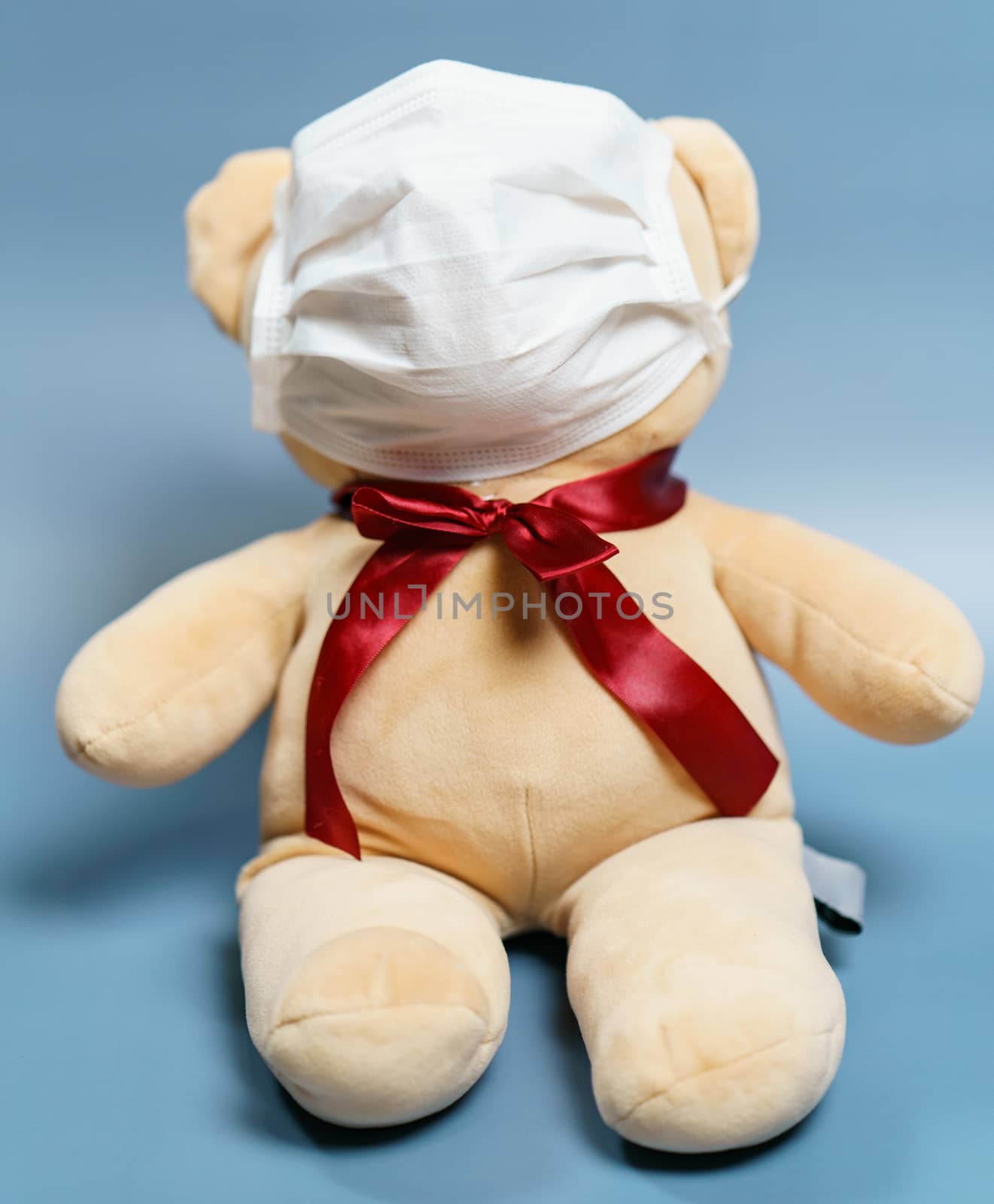 Teddy bear wearing face mask. Protection epidemic Coronavirus, Covid-19.