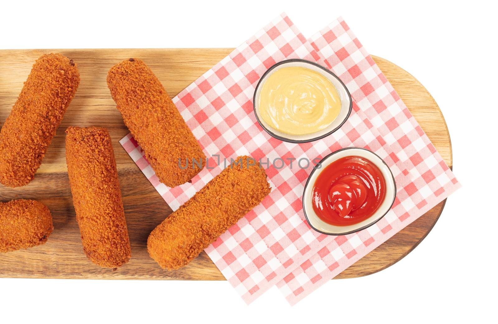 Brown crusty dutch kroketten on a serving tray isolated on a white background